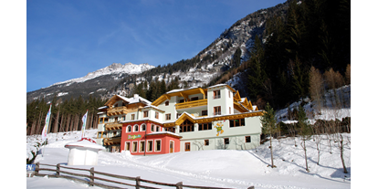 Wanderurlaub - Schwierigkeit Klettersteig: D - Kärnten - Hotel im Winter - Außenasicht - Pirker’s Natur & Bio Familienhotel