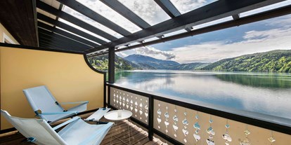 Wanderurlaub - Umgebungsschwerpunkt: See - Kerschdorf (Nötsch im Gailtal) - Zimmerbalkon mit direktem Seeblick - Seeglück Hotel Forelle