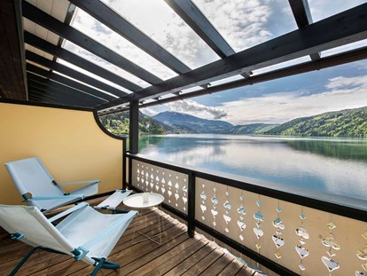 Wanderurlaub - kostenlose Wanderkarten - Kremsbrücke - Zimmerbalkon mit direktem Seeblick - Seeglück Hotel Forelle