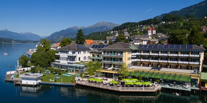 Wanderurlaub - Hotel-Schwerpunkt: Wandern am See - Laggen (Krems in Kärnten) - Hotelansicht im Sommer - Seeglück Hotel Forelle