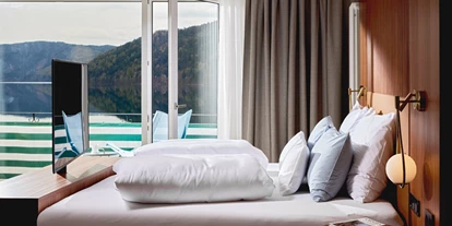 Wanderurlaub - Bettgrößen: Doppelbett - Densdorf - Direkt vom Bett aus auf den See blicken - Seeglück Hotel Forelle