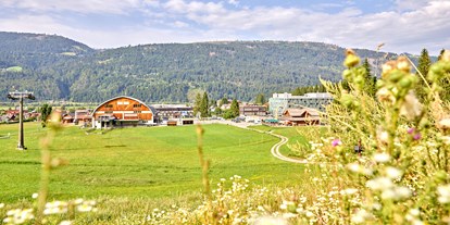 Wanderurlaub - Ausrüstungsverleih: Rucksäcke - Gailtaler Alpen - Außenfassade
 - Arena Franz Ferdinand Nassfeld