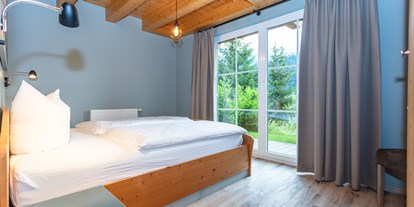Wanderurlaub - Bettgrößen: Doppelbett - Lofer - Schlafzimmer - Feriendorf Wallenburg