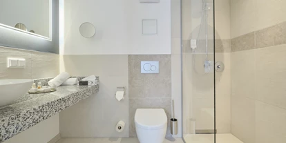 Wanderurlaub - Dampfbad - Bühne - Beispiel Badezimmer aus der Junior Suite - sonnenresort ETTERSHAUS