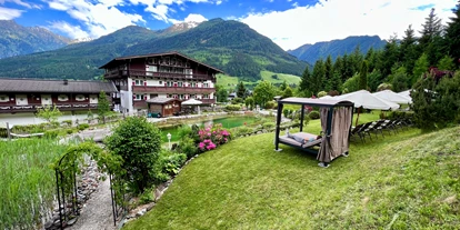 Wanderurlaub - Hüttenreservierung - Mayrhofen (Mittersill) - Den Urlaubstag gemütlich im Garten verbringen - Hotel Hubertus