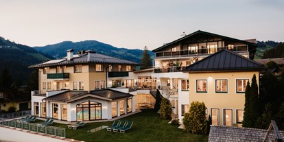 Wanderurlaub - Preisniveau: günstig - Radstadt - Außenansicht Sommer Hotel Alpina Wagrain**** - Alpina Wagrain**** 