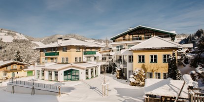 Wanderurlaub - Pools: Innenpool - Großarl - Außenansicht Winter Hotel Alpina Wagrain**** - Alpina Wagrain**** 