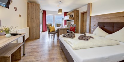 Wanderurlaub - Bettgrößen: Twin Bett - Region Zell am See - Modern und im Landhausstil eingerichtete Doppel / Familienzimmer laden zum ausschlafen ein - Berghotel Jaga Alm 