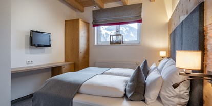 Wanderurlaub - Bettgrößen: Doppelbett - Lofer - Zimmeransicht - Ski & Bike Hotel Wiesenegg