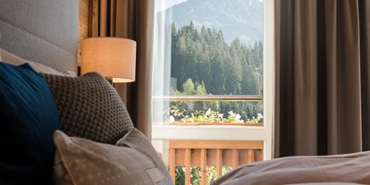 Wanderurlaub - Sonnenterrasse - Höggen - Hotelzimmer mit Blick auf den Rettenstein - meiZeit Lodge