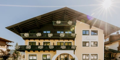 Wanderurlaub - Hüttenreservierung - Schlaming - Außenansicht im Sommer - B&B Hotel Die Bergquelle