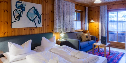 Wanderurlaub - Ausrüstungsverleih: Wanderschuhe - Lunden (Schiers) - Doppelzimmer Elegant premium mit Wohnbereich - Bio-Hotel Saladina