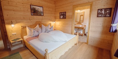 Wanderurlaub - Bettgrößen: Doppelbett - Salzkammergut - Schlafzimmer im Ferienhaus Salzkammergut Plus - Narzissendorf Zloam