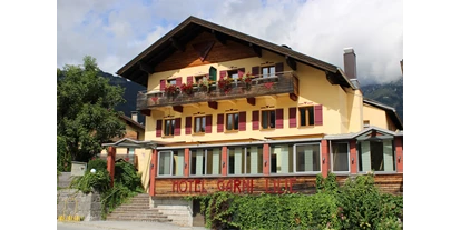 Wanderurlaub - WLAN - Weißenbach am Lech - Sommeraussenansicht - Die Lilie - Hotel Garni