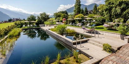Wanderurlaub - persönliche Tourenberatung - Volderwald - 20m biologischer Schwimmteich - Gardenhotel Crystal