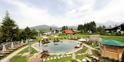 Wanderurlaub - persönliche Tourenberatung - Toblaten - Garten mit Naturbadeteich - Wellnesshotel Schönruh - Adults Only