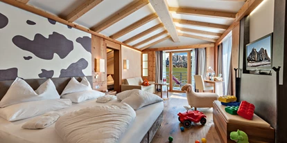 Wanderurlaub - Trockenraum - Trentino-Südtirol - Suite "Dolasilla" mit Balkon (Berg oder Talblick) -  Hotel Emmy-five elements