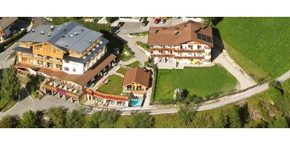 Wanderurlaub - Preisniveau: günstig - Italien - Winter wie Sommer der ideale Treffpunkt für Aktivurlauber. Im schönstem Dolomitenkino mit Sonnenuhrpanorama genießen Sie viel Sonne und regionale, biologische Köstlichkeiten.  - Biovita Hotel Alpi