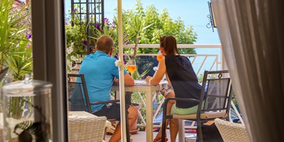 Wanderurlaub - Restaurant - Kärnten - Urlaub im Flairhotel am Wörthersee-
eine Terrasse mit herrlichem Ausblick - Flairhotel am Wörthersee