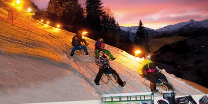Wanderurlaub - geführte Klettertour - Obertauern - Hoteleigene Rodelbahn im Winter mit Gratistransfer für Hotelgäste Hotel Lammwirt Großarl - Hotel Lammwirt