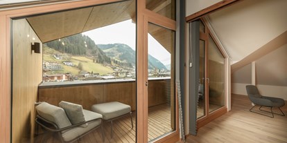 Wanderurlaub - Winterwanderung - Großarl - Unsere großzügige Terrasse in der Bergzeitsuite. Atemberaubender Ausblick inklusive! - Hotel Bergzeit****