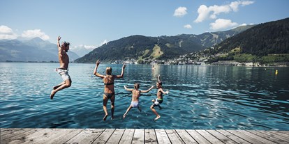 Wanderurlaub - Hüttenreservierung - Hinterglemm - Badespaß am Zeller See - Hotel Sonnblick