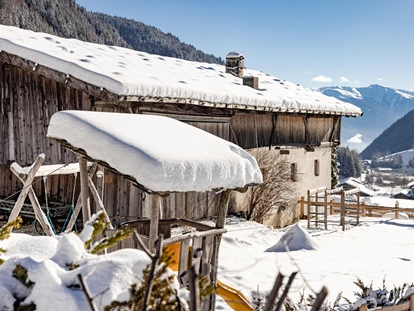Wanderurlaub - Winterwanderung - Trentino-Südtirol - Kinderspielplatz Winter - Hotel Masl