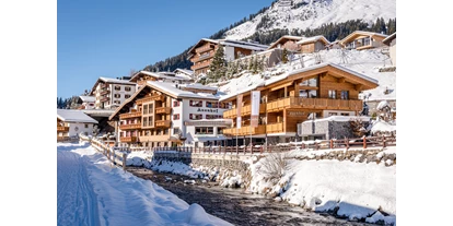 Wanderurlaub - Hüttenreservierung - Bregenzer - Außenansicht Winter - Hotel Auenhof