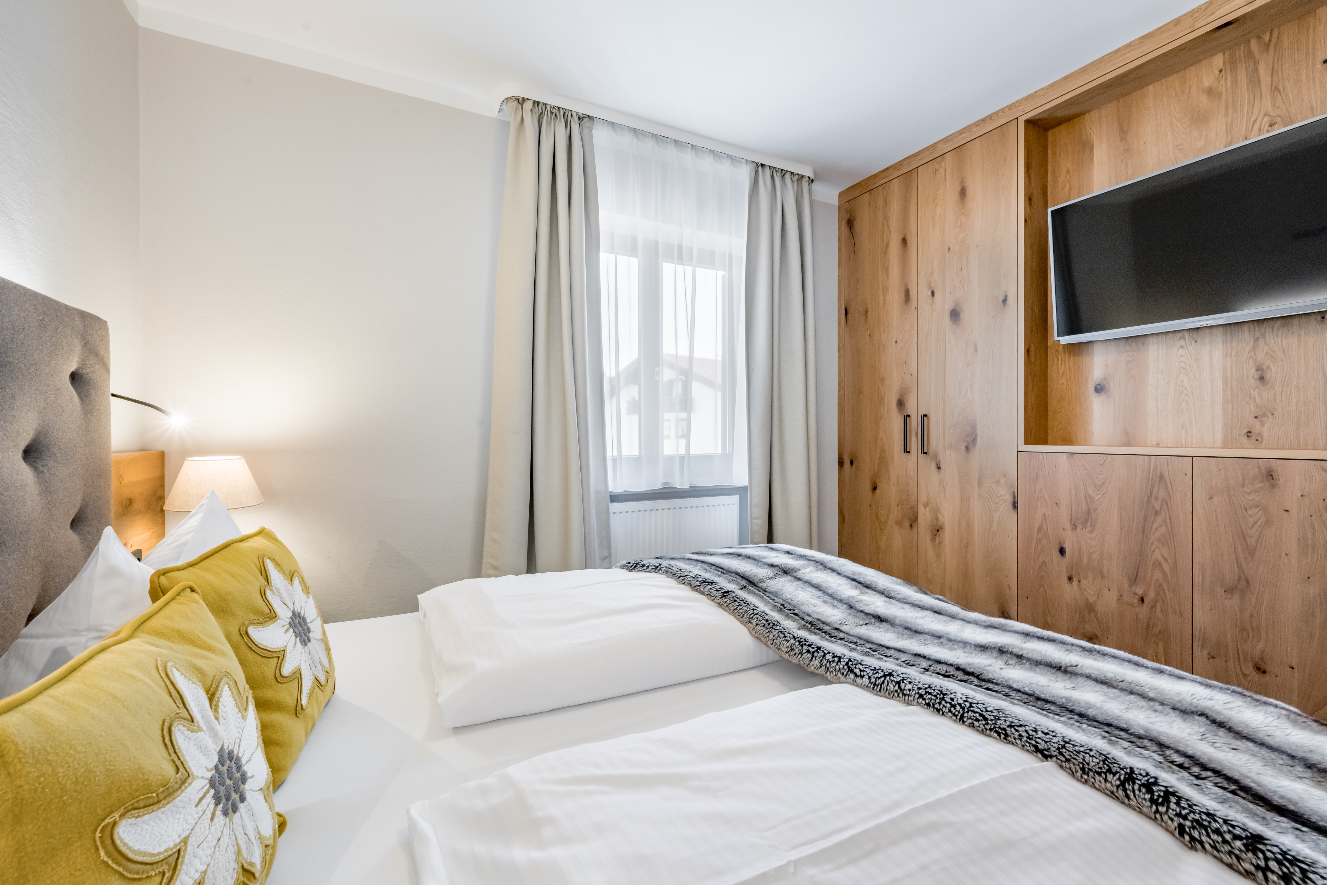 Wanderhotel: Suite Taubensee Schlafzimmer - Hotel Ruhpoldinger Hof