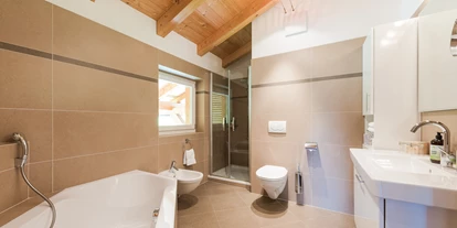 Wanderurlaub - Brenner - Badezimmer Kuschelsuite  - Naturhotel Rainer