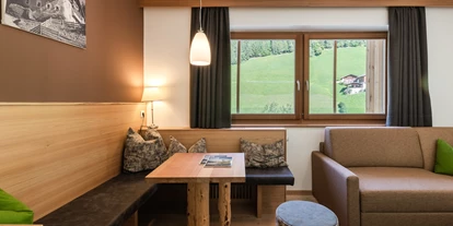 Wanderurlaub - Brenner - Juniorsuite - Aufenthaltsraum  - Naturhotel Rainer
