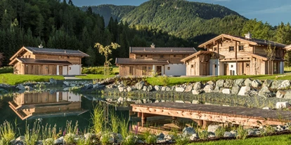 Wanderurlaub - Fahrstuhl - Bayern - Chaletdorf auf Gut Steinbach mit Naturschwimmteich - Gut Steinbach Hotel Chalets SPA