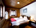 Wanderhotel: Schlafzimmer Ausstattung Gipfel - Slow Travel Resort Kirchleitn
