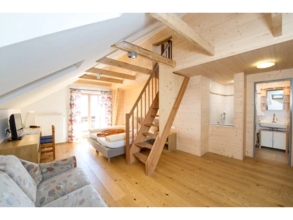 Wanderurlaub - Kötschach-Mauthen - Juniorsuite - Familienzimmer  -   Sattleggers Alpenhof & Feriensternwarte
