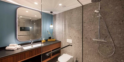 Wanderurlaub - Fahrstuhl - Moderne Badezimmer - Seeglück Hotel Forelle