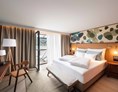 Wanderhotel: Moderne Zimmer im Hotel Forelle - Seeglück Hotel Forelle