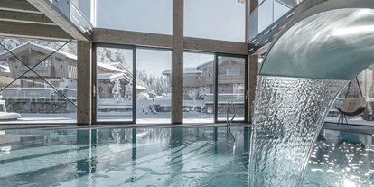 Wanderurlaub - Fahrstuhl - INNs HOLZ Natur- & Vitalhotel****s Ausblick vom Indoorpool im Winter - INNs HOLZ Natur- & Vitalhotel****s