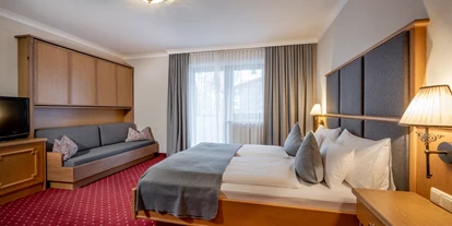 Wanderurlaub - Pools: Schwimmteich - Zimmeransicht - Ski & Bike Hotel Wiesenegg