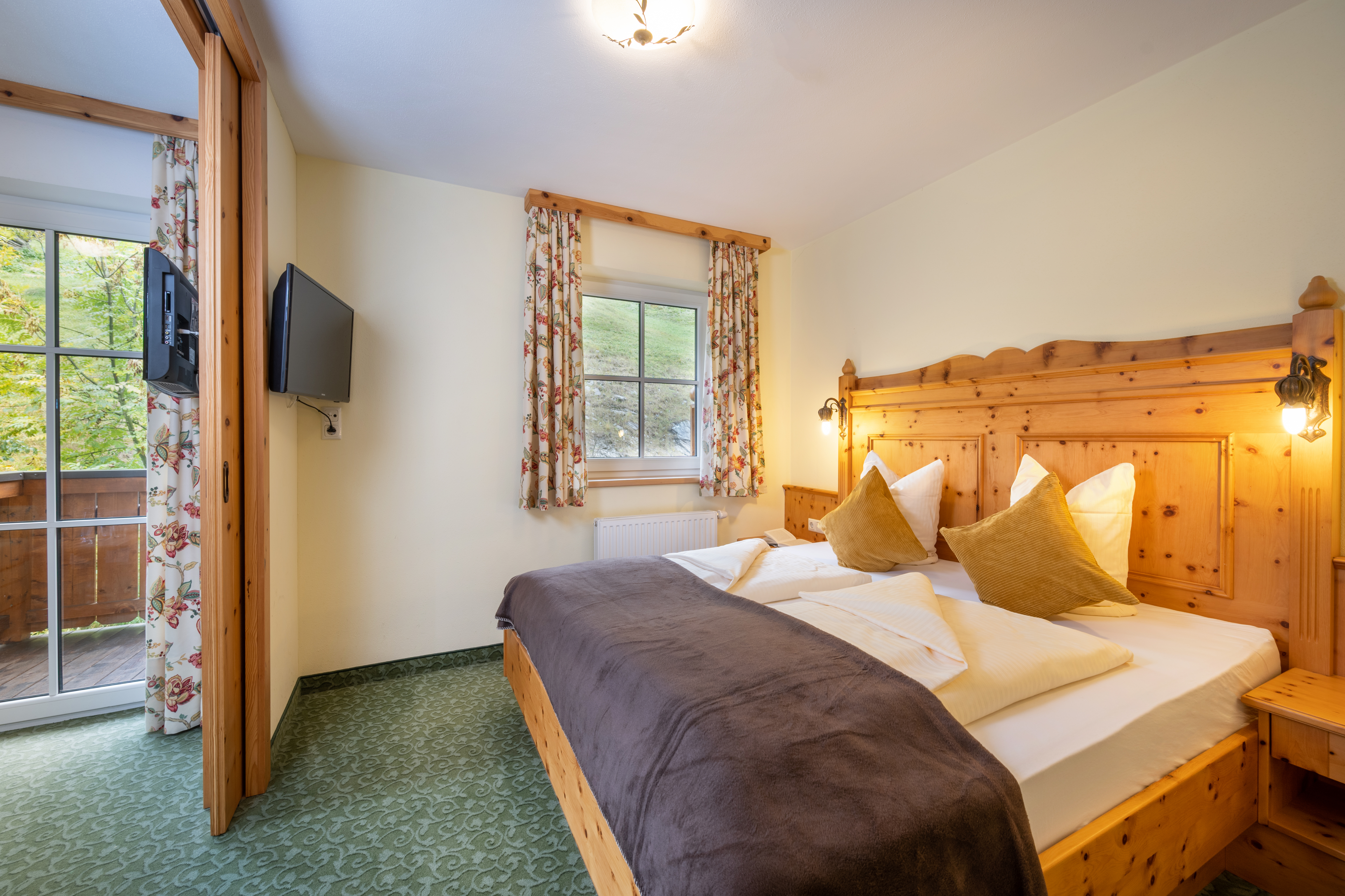 Naturhotel Huettenwirt Zimmerkategorien Wohlfühl-Familienstudio 