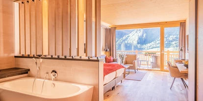Wanderurlaub - Pools: Schwimmteich - Hotel Damülser Hof - Wellness & Spa