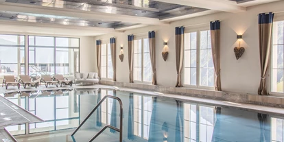 Wanderurlaub - Pools: Schwimmteich - Hotel Damülser Hof - Wellness & Spa