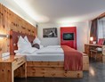 Wanderhotel: Zimmer Deluxe mit Balkon - Alpen Adria Hotel und SPA
