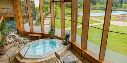 Wanderurlaub - Pools: Schwimmteich - AlpenParks Hotel & Apartment Carpe Solem Mariapfarr