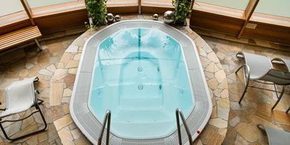 Wanderurlaub - Pools: Schwimmteich - AlpenParks Hotel & Apartment Carpe Solem Mariapfarr