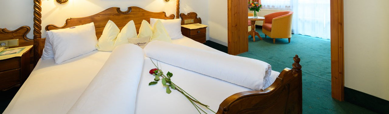 Alpenpark Resort Seefeld Zimmerkategorien Haus Dreitorspitze – Juniorsuite „Tirol“ mit Balkon