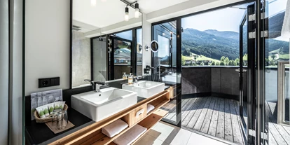 Wanderurlaub - Pools: Schwimmteich - Wohnbeispiel Premium Suite de Luxe  - Dolomiten Residenz****s Sporthotel Sillian