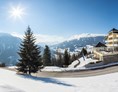 Wanderhotel: Aussenansicht Hotel Winter - Wellness Aparthotel Panorama Alpin