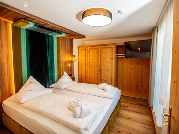 Moseralm Dolomiti Spa Resort Zimmerkategorien Suite Karersee mit Whirlpool