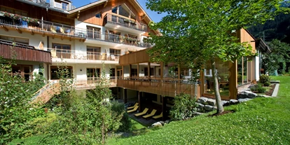 Wanderurlaub - Pools: Schwimmteich - Felbermayer Hotel & Alpin Spa Montafon