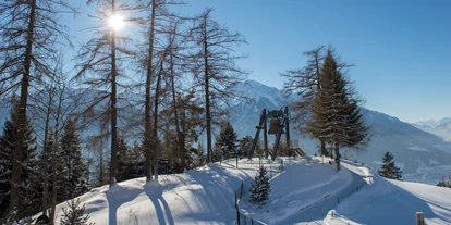 Wanderurlaub - Hotel-Schwerpunkt: Wandern & Biken - Tirol - Friedensglocke im Garten - Inntalerhof - DAS Panoramahotel